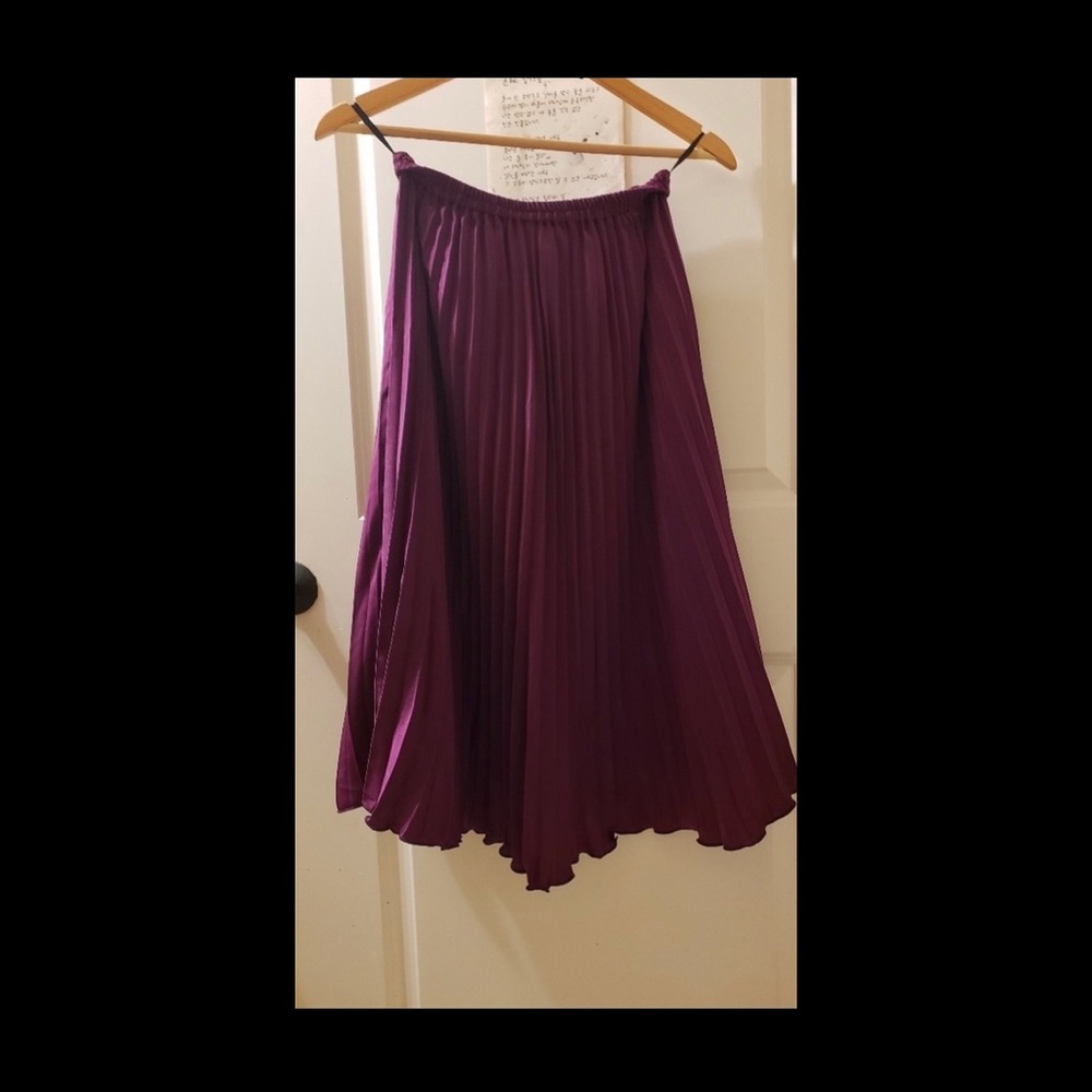Long purple pleated skirt